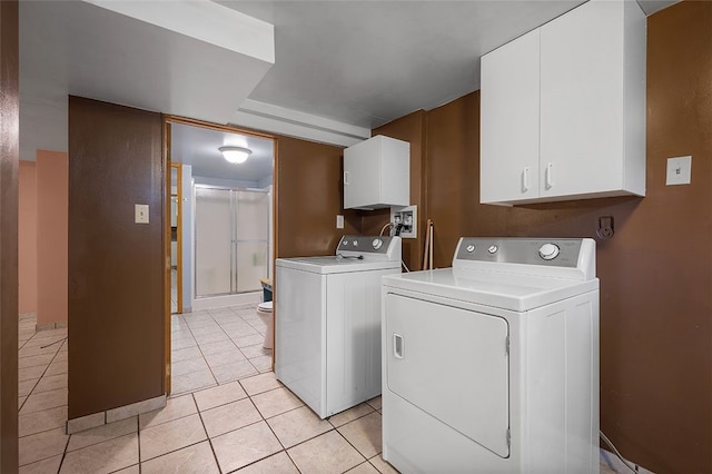 115 Shippingport Rd, Aliquippa, PA 15001 - washroom with independent washer and dryer, cabinet space, and light tile patterned floors