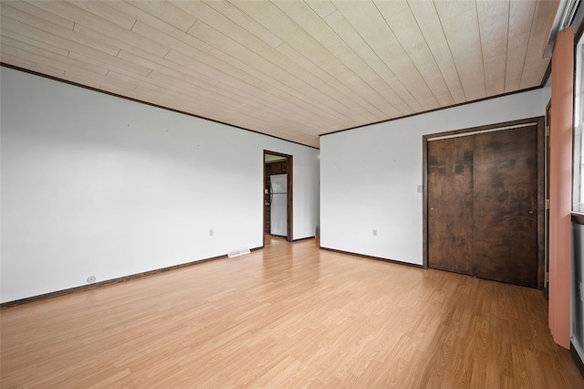 115 Shippingport Rd, Aliquippa, PA 15001 - unfurnished bedroom with light wood-type flooring, freestanding refrigerator, and wooden ceiling