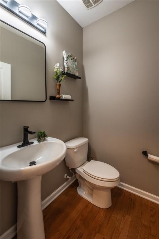 106 Kestler Dr, Pine Twp, PA 15090 - bathroom with baseboards and wood finished floors