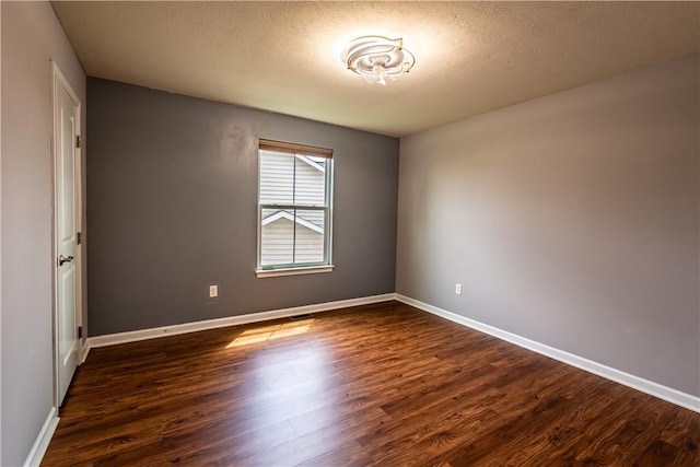 106 Kestler Dr, Pine Twp, PA 15090 - unfurnished room featuring dark wood-type flooring and a textured ceiling