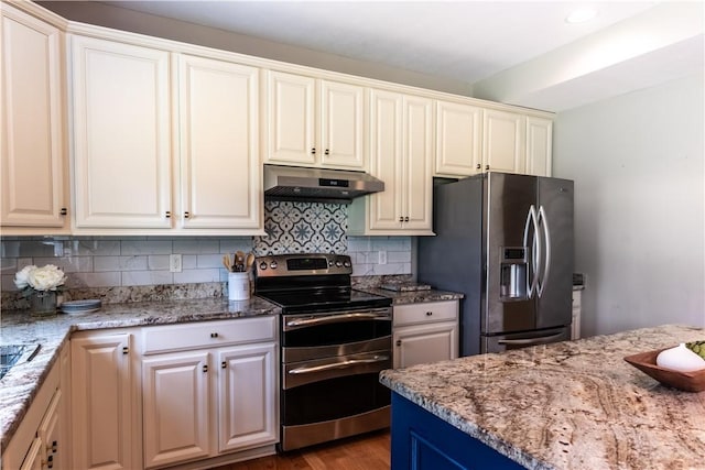 106 Kestler Dr, Pine Twp, PA 15090 - kitchen featuring appliances with stainless steel finishes, under cabinet range hood, decorative backsplash, and wood finished floors
