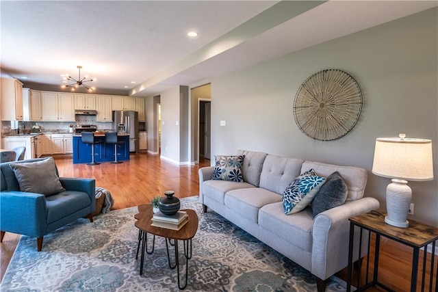 106 Kestler Dr, Pine Twp, PA 15090 - living area featuring light wood-type flooring, a chandelier, and recessed lighting