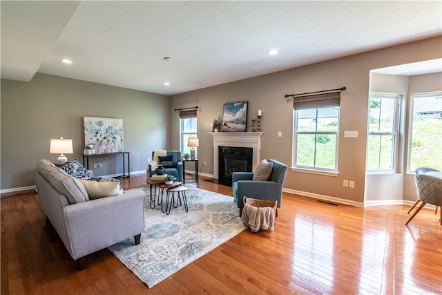 106 Kestler Dr, Pine Twp, PA 15090 - living room with a fireplace with flush hearth, hardwood / wood-style flooring, and recessed lighting