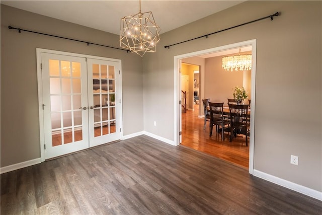 106 Kestler Dr, Pine Twp, PA 15090 - unfurnished dining area with a chandelier, french doors, and dark wood-style flooring