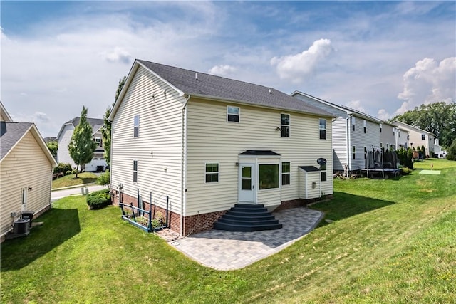 106 Kestler Dr, Pine Twp, PA 15090 - rear view of property with a trampoline and a yard