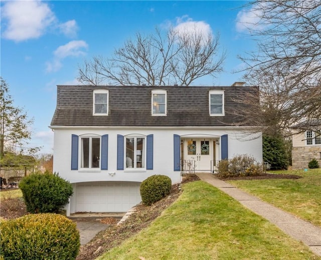 1742 Partridge Run Rd, Saint Clair, PA 15241 - front of property featuring a shingled roof, mansard roof, an attached garage, and a front yard