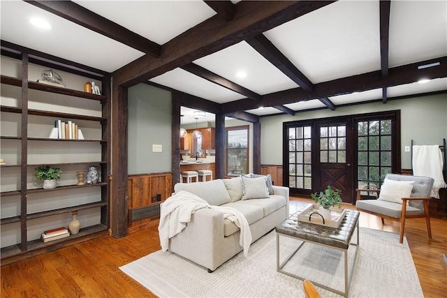 1742 Partridge Run Rd, Saint Clair, PA 15241 - living room with wainscoting, beam ceiling, wood finished floors, coffered ceiling, and wood walls