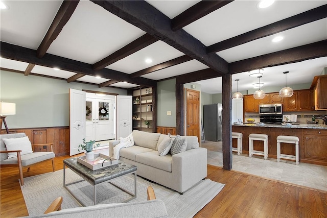 1742 Partridge Run Rd, Saint Clair, PA 15241 - living area featuring wainscoting, beamed ceiling, light wood finished floors, recessed lighting, and wood walls