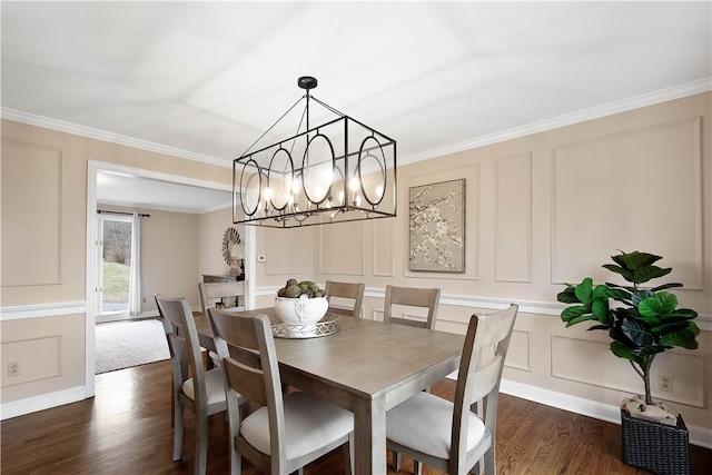1742 Partridge Run Rd, Saint Clair, PA 15241 - dining area with a decorative wall, dark wood-style floors, crown molding, and a chandelier