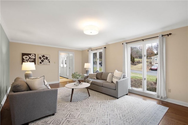1742 Partridge Run Rd, Saint Clair, PA 15241 - living room featuring wood finished floors and crown molding