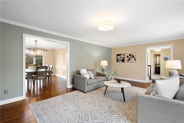 1742 Partridge Run Rd, Saint Clair, PA 15241 - living area with crown molding, dark wood finished floors, and a chandelier