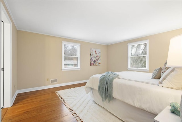 1742 Partridge Run Rd, Saint Clair, PA 15241 - bedroom with wood finished floors and ornamental molding