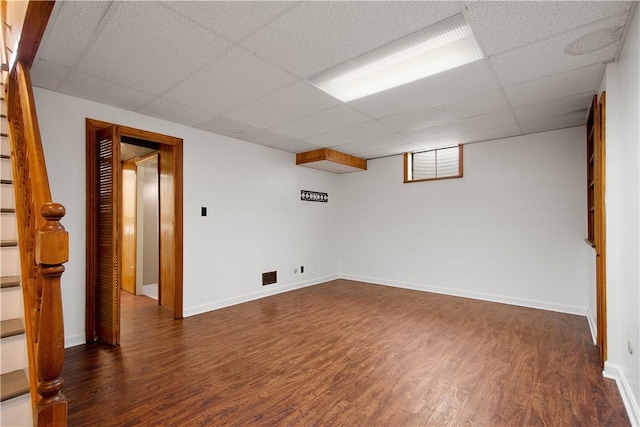 1742 Partridge Run Rd, Saint Clair, PA 15241 - basement with a drop ceiling, dark wood-style floors, and stairway