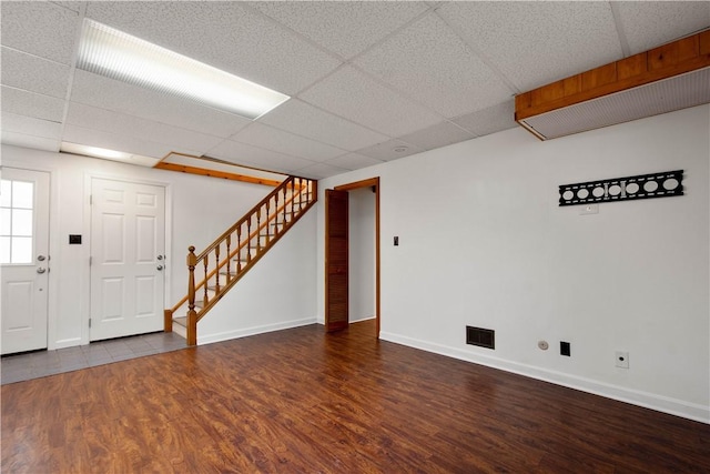 1742 Partridge Run Rd, Saint Clair, PA 15241 - basement with wood finished floors, a drop ceiling, and stairway