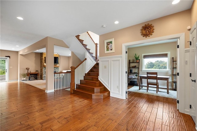 207 Tamarack Dr, Adams Twp, PA 16046 - entrance foyer with wood-type flooring, stairway, healthy amount of natural light, and recessed lighting
