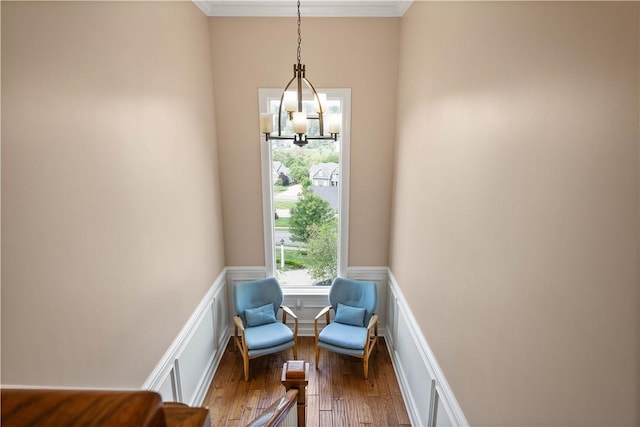 207 Tamarack Dr, Adams Twp, PA 16046 - living area with crown molding, wood-type flooring, and wainscoting