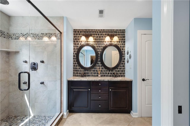 207 Tamarack Dr, Adams Twp, PA 16046 - full bath featuring a shower stall, double vanity, and tile patterned flooring