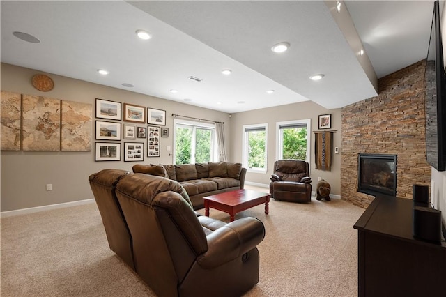 207 Tamarack Dr, Adams Twp, PA 16046 - carpeted living room featuring a stone fireplace and recessed lighting