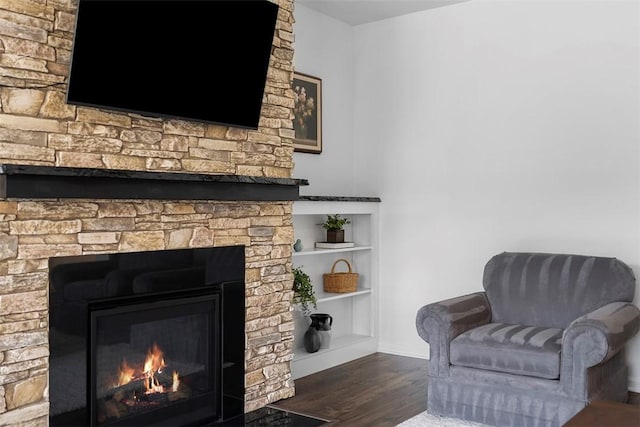 2034 Aiken Ct, Robinson Twp, PA 15136 - sitting room featuring a stone fireplace and wood finished floors