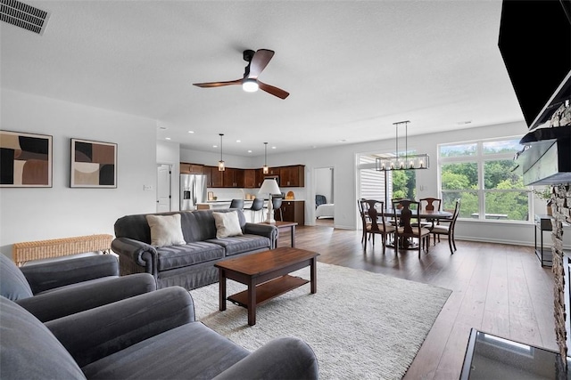 2034 Aiken Ct, Robinson Twp, PA 15136 - living area featuring a ceiling fan, hardwood / wood-style flooring, a chandelier, and recessed lighting