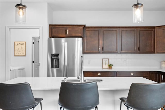 2034 Aiken Ct, Robinson Twp, PA 15136 - kitchen featuring stainless steel refrigerator with ice dispenser, light countertops, and pendant lighting
