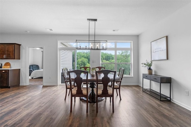 2034 Aiken Ct, Robinson Twp, PA 15136 - dining area with a chandelier and dark wood finished floors