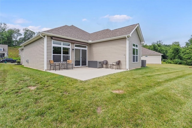 2034 Aiken Ct, Robinson Twp, PA 15136 - rear view of house featuring a patio, a yard, and roof with shingles