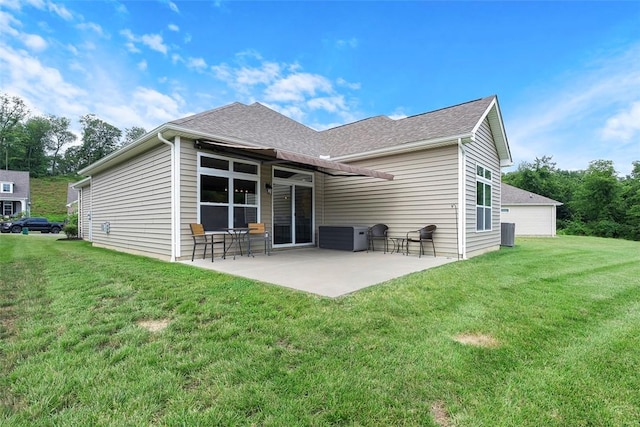 2034 Aiken Ct, Robinson Twp, PA 15136 - back of property with a patio, a yard, and roof with shingles