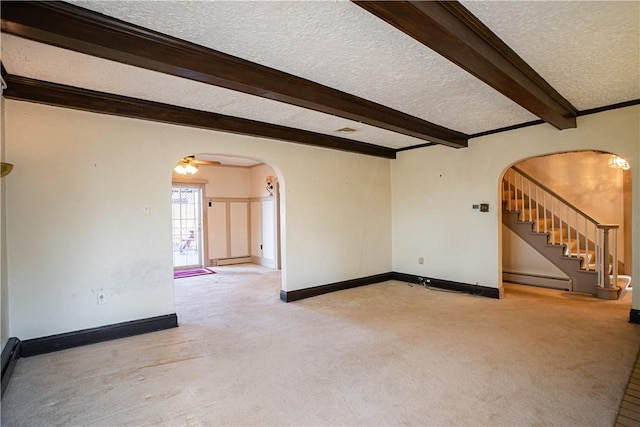 109 Maplewood Ave, Center Twp, PA 15001 - spare room with arched walkways, a textured ceiling, light carpet, beamed ceiling, and a baseboard heating unit