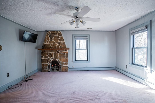 109 Maplewood Ave, Center Twp, PA 15001 - unfurnished living room featuring carpet floors, a baseboard radiator, a stone fireplace, a ceiling fan, and a textured ceiling