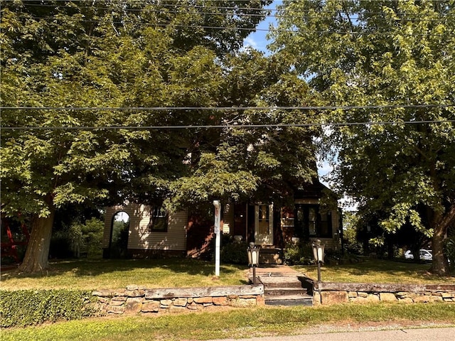 109 Maplewood Ave, Center Twp, PA 15001 - view of property hidden behind natural elements featuring a front yard
