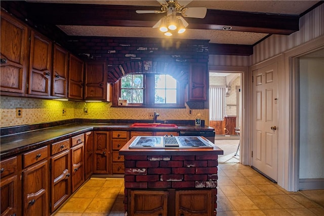 109 Maplewood Ave, Center Twp, PA 15001 - kitchen featuring dark countertops, ceiling fan, beamed ceiling, and light tile patterned floors
