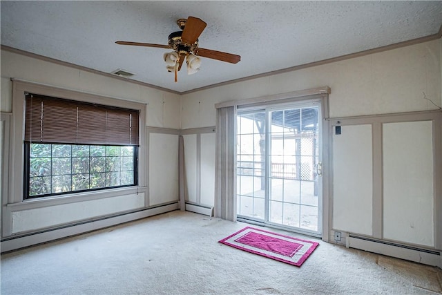 109 Maplewood Ave, Center Twp, PA 15001 - carpeted empty room featuring a baseboard radiator, ornamental molding, plenty of natural light, ceiling fan, and a decorative wall