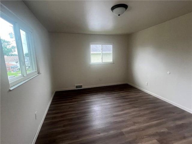1735 Kimball Ave, New Kensington, PA 15068 - spare room featuring dark wood-type flooring and baseboards