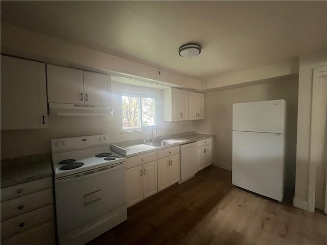 1735 Kimball Ave, New Kensington, PA 15068 - kitchen with white appliances, under cabinet range hood, dark wood-style flooring, white cabinets, and light countertops