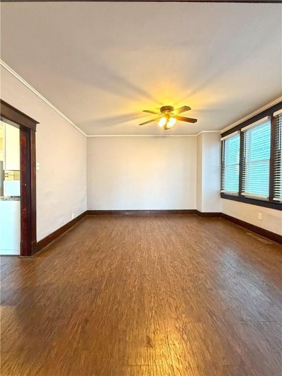 514 Linden Ave, New Kensington, PA 15068 - spare room with a ceiling fan, wood finished floors, and crown molding
