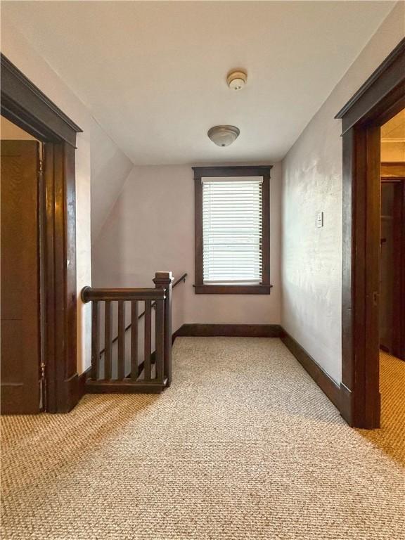 514 Linden Ave, New Kensington, PA 15068 - corridor with an upstairs landing, carpet, and vaulted ceiling