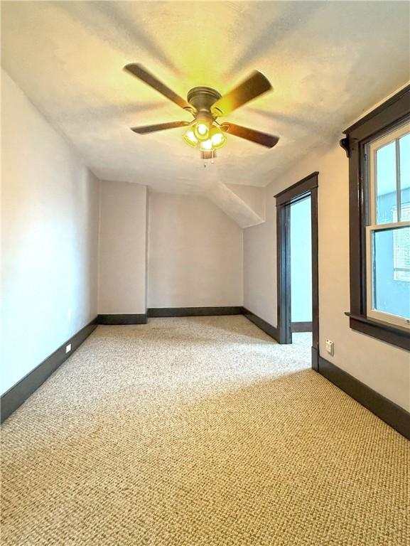 514 Linden Ave, New Kensington, PA 15068 - additional living space featuring ceiling fan and light carpet