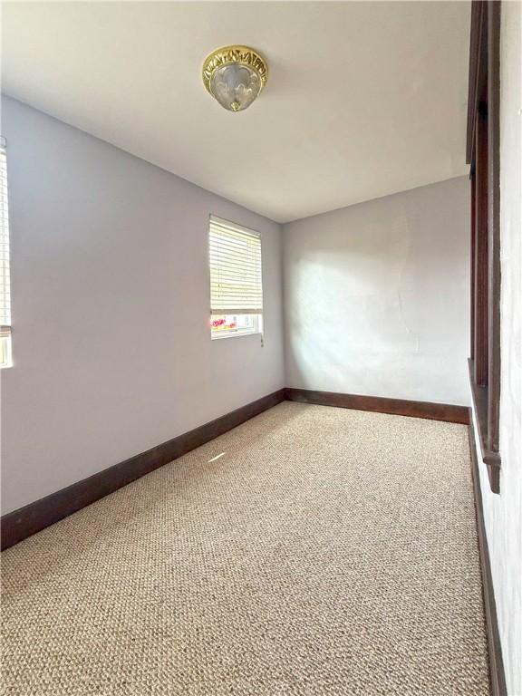 514 Linden Ave, New Kensington, PA 15068 - carpeted spare room with baseboards