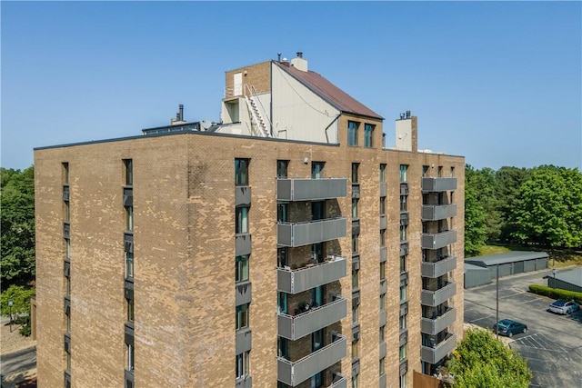 820 E Beau St Unit 6J, South Strabane, PA 15301 - view of building exterior featuring uncovered parking