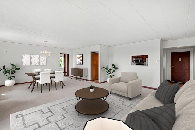 820 E Beau St Unit 6J, South Strabane, PA 15301 - carpeted living room featuring baseboards and a chandelier