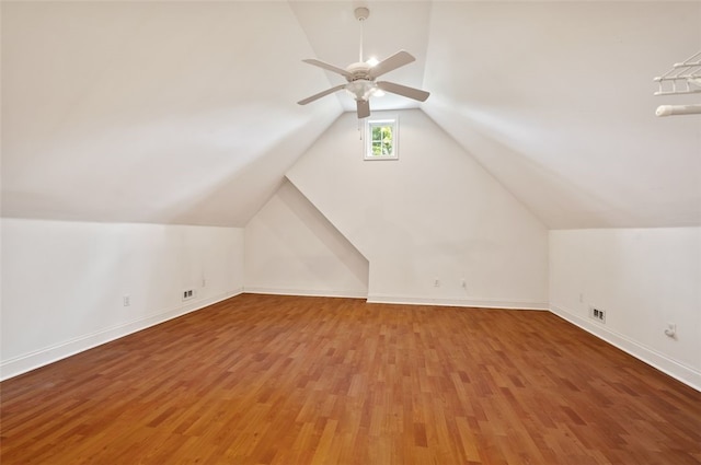801 Huron Ct, Adams Twp, PA 15044 - additional living space with vaulted ceiling, wood finished floors, and a ceiling fan