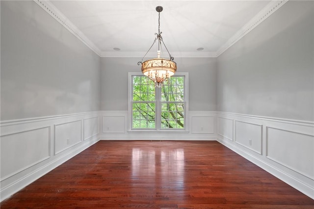 801 Huron Ct, Adams Twp, PA 15044 - spare room with a chandelier, dark wood-style flooring, a wainscoted wall, and ornamental molding