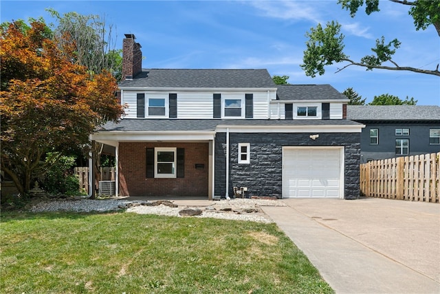 327 Charles Ave, New Kensington, PA 15068 - traditional-style home featuring a chimney, a garage, driveway, and roof with shingles