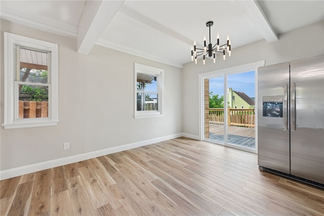 327 Charles Ave, New Kensington, PA 15068 - unfurnished dining area featuring beamed ceiling, a chandelier, plenty of natural light, and light wood-type flooring