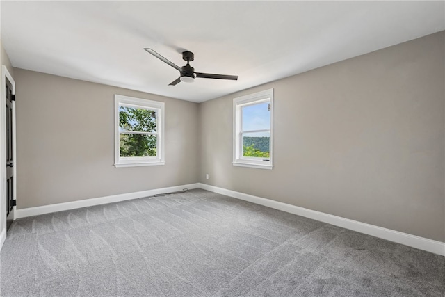 327 Charles Ave, New Kensington, PA 15068 - carpeted empty room featuring ceiling fan and healthy amount of natural light
