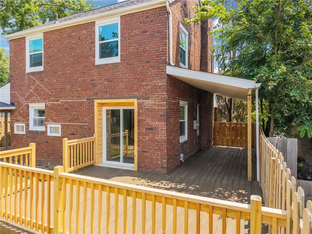 327 Charles Ave, New Kensington, PA 15068 - rear view of property featuring a deck and brick siding