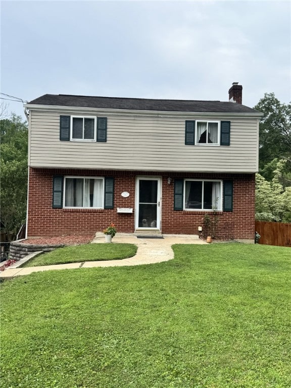 1541 Sugarloaf, Plum Boro, PA 15239 - colonial house with a chimney and brick siding