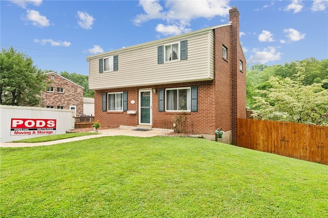 1541 Sugarloaf, Plum Boro, PA 15239 - colonial home featuring a chimney and brick siding