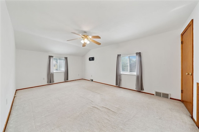 1541 Sugarloaf, Plum Boro, PA 15239 - empty room featuring a ceiling fan, plenty of natural light, lofted ceiling, and light carpet